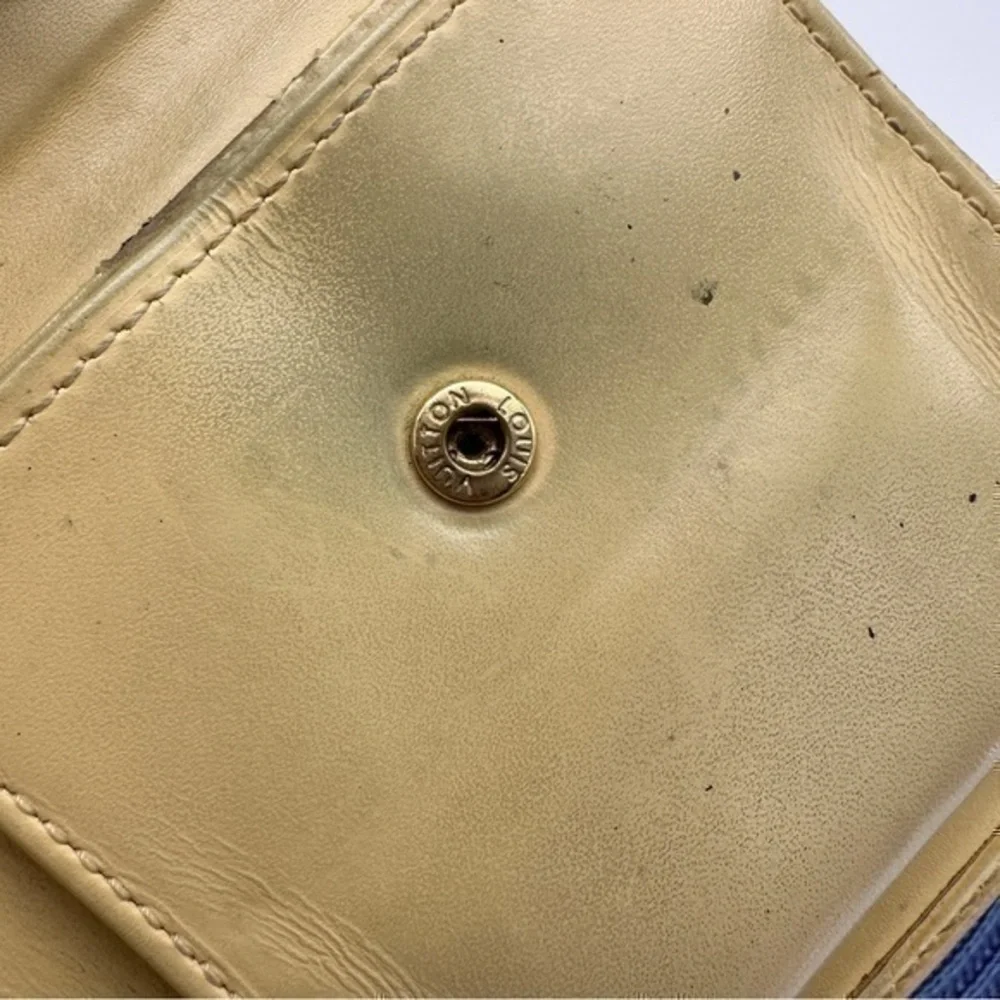 AUTHENTIC Louis Vuitton Marco Wallet. Previously owned. Light yellow.
